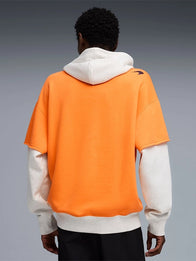 McLaren F1 Team Puma Racing Hoodie Hoodie unisex detail view 2 | Dash Racegear — A bright orange McLaren F1 Team Puma 2026 Racing Hoodie featuring fleece lining and race-inspired style for supporters.