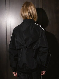Parke Sport Stripe Nylon Jacket Jacket unisex detail view 3 | Dash Racegear — Parke 2026 black nylon jacket with sporty stripe detail, ideal for active days or casual outfits.