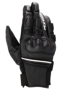 Alpinestars Phenom Leather Gloves, Black and White, short-cuff motorcycle gloves with hard knuckle protection, perforated leather details, white Alpinestars branding on the index finger, and white stripe accent at the wrist