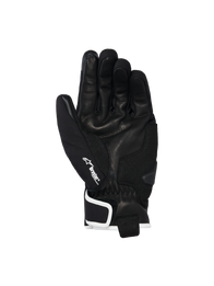 Alpinestars Moblast Waterproof Gloves, Black with Off-White trim, palm side view showing goat leather construction, white Drystar logo on the thumb, and palm slider reinforcement, short-cuff urban motorcycle gear
