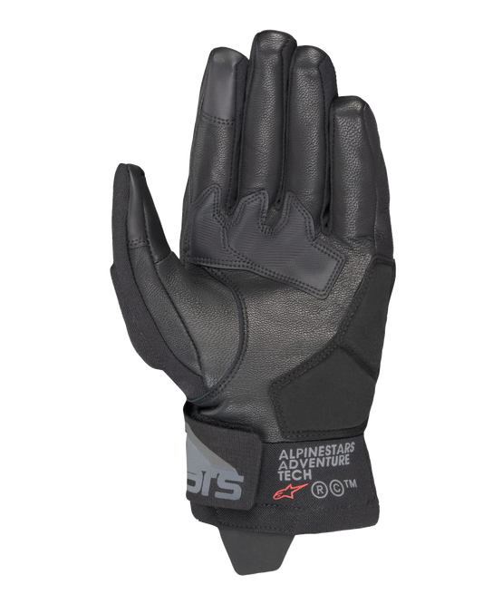 Alpinestars Corozal V3 Drystar® Gloves, Black, Palm side view showing leather construction with reinforced patches, short cuff with Alpinestars Adventure Tech branding, touchscreen-compatible fingertips, durable all-weather adventure motorcycle gear.