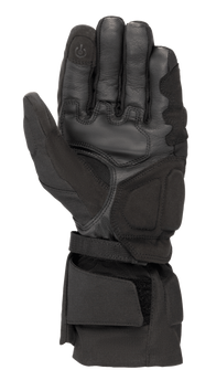 Alpinestars WR-X GORE-TEX Gloves, Black motorcycle winter gloves, palm side view showing leather and synthetic suede construction, long cuff with adjustable strap, and conductive touchscreen-compatible fingertip.