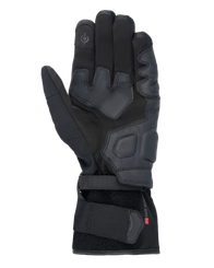 Alpinestars Tourer W-7 V2 Drystar® Gloves, Black motorcycle gloves, palm view featuring leather reinforcements, padded grip areas, touchscreen-compatible fingertip, and secure wrist strap closure.
