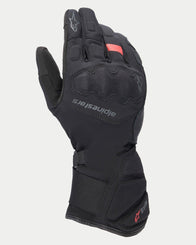 Alpinestars Women Stella Tourer W-7 V2 Drystar® Gloves, Black winter touring motorcycle gloves, long cuff design with integrated knuckle protection, featuring textile and leather panels with red Drystar branding and reflective accents.