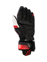 Alpinestars GP Plus R V3 Leather Gloves, Racing/Sport Motorcycle Gloves, Black White and Bright Red, palm view showing reinforced leather construction, palm sliders, and an aramid stretch cuff, featuring a secure wrist strap with Alpinestars logo and ergonomic pre-curved design