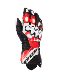 Alpinestars GP Plus R V3 Leather Gloves, Motorcycle Racing Gloves, Black White and Bright Red, featuring a large white knuckle protector with black wave patterns, perforated leather panels for ventilation, and Alpinestars branding on the cuff.