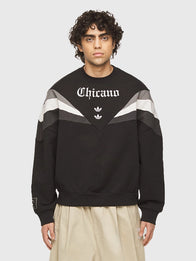 Adidas x Willy Chavarria Chicano Crewneck 2.0 Sweatshirt Sweatshirt unisex detail view 3 | Dash Racegear — Unisex Adidas Chicano 2.0 crewneck sweatshirt in black with bold puff-print eagle and heritage-inspired front design.