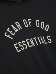 Fear Of God Essentials Black Hoodie Hoodie unisex detail view 3 | Dash Racegear — Fear Of God Essentials Hoodie in black, pullover, cozy fleece, and roomy fit for men and women on chilly days.