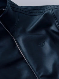 Adidas A-Type Leather Track Jacket Jacket unisex detail view 2 | Dash Racegear — Adidas A-Type 2026 black leather track jacket offers a refined sporty look with premium texture and a clean unisex fit.