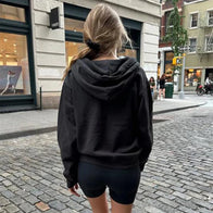 Brandy Melville Christy Hoodie Hoodie unisex detail view 4 | Dash Racegear — Stay comfy and stylish in the relaxed fit of the Brandy Melville Christy Hoodie.