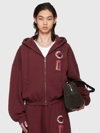 BRUCE LEE x LUU DAN Zip Hoodie Hoodie unisex front product view | Dash Racegear — 2026 BRUCE LEE x LUU DAN Burgundy Full Zip Hoodie with bold streetwear look and relaxed everyday fit.
