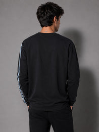 Jung Kook x Calvin Klein Racing Stripe T-Shirt Shirt unisex detail view 7 | Dash Racegear — Jung Kook BTS long sleeve shirt by Calvin Klein with contrasting race stripes and a black monochrome base