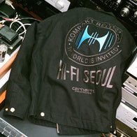 Carhartt WIP Kompakt Record Bar Jacket Jacket unisex detail view 4 | Dash Racegear — Back of a black Carhartt WIP and Kompakt Record Bar collaboration jacket, showcasing the "HI-FI SEOUL" design
