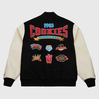 M&N x Cookies Full-Snap Varsity Jacket Varsity Jacket unisex detail view 2 | Dash Racegear — Black wool body varsity jacket with beige leather sleeves 2025 edition