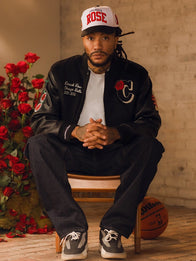 Derrick Rose Chicago Bulls Retirement Letterman Jacket Jacket unisex detail view 2 | Dash Racegear — Black Derrick Rose Chicago Bulls Retirement Letterman Jacket features full-snap closure and vintage flair for fans of all genders.