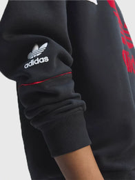 Adidas Manchester United 90 Sweatshirt Sweatshirt unisex detail view 5 | Dash Racegear — Adidas Manchester United 90s black fleece sweatshirt, Legendary 91/92 edition for vintage sporty outfits.