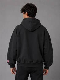Gap x Katseye Lara Hoodie Hoodie unisex detail view 6 | Dash Racegear — Black Gap x Katseye hoodie carrying Lara edition marks, loose torso cut, ribbed cuffs, and fleece backing