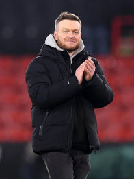 Kim Hellberg Sky Bet Championship Puffer Jacket Puffer Jacket unisex front product view | Dash Racegear — Black quilted puffer hooded jacket by Kim Hellberg for Sheffield United vs Middlesbrough Sky Bet Championship match.