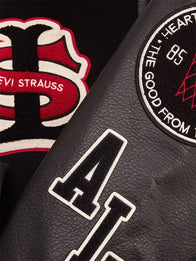 Levi’s x Jordan 2026 Varsity Jacket Varsity Jacket unisex detail view 5 | Dash Racegear — Levi’s x Jordan 2026 black varsity jacket featuring leather sleeves, perfect for streetwear lovers and collectors.