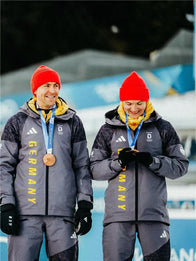 Winter Olympics 2026 Team Germany Opening Ceremony Jacket Jacket unisex front product view | Dash Racegear — Milano Cortina 2026 Winter Olympics Team Germany grey hooded jacket with sleek logo and zip, perfect for cold parade days.