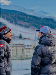 Winter Olympics 2026 Team Austria Grey Jacket Jacket unisex detail view 3 | Dash Racegear — Milano Cortina 2026 Winter Olympics ski jumping track grey jacket with hood and embroidered Austria crest.