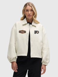 Philadelphia Flyers lululemon Coach’s Jacket Jacket unisex front product view | Dash Racegear — Recreated Philadelphia Flyers lululemon Coach's jacket in cream designed with lightweight insulation and relaxed streetwear appeal