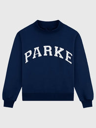 Parke Polka Dot Letter Varsity Mockneck Sweatshirt Sweatshirt unisex front product view | Dash Racegear — Navy Parke crew recreated with contrasting dot print surrounding oversized collegiate monogram