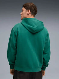 PUMA x Aston Martin Aramco F1 Hoodie Hoodie unisex detail view 2 | Dash Racegear — Unisex PUMA x Aston Martin Aramco F1 Team Green Hoodie featuring lightweight fleece and zip front, great for daily layering.