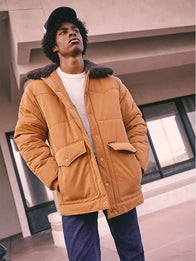 Stranger Things Wrangler Jim Hopper Jacket Jacket unisex detail view 2 | Dash Racegear — David Harbour Wrangler x Stranger Things S05 puffer jacket in brown is ideal for fans braving winter streets.