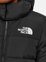 The North Face Long Puffer Jacket Puffer Jacket unisex detail view 4 | Dash Racegear — Women's long black puffer jacket with hood, The North Face, warm and functional for outdoor adventures.