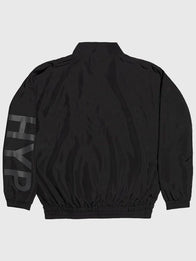 Hypebeast x Umbro 20th Anniversary Spellout Track Jacket Jacket unisex detail view 2 | Dash Racegear — Hypebeast x Umbro logo spellout jacket blending streetwear and sport