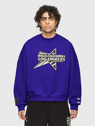 Adidas x Willy Chavarria Star Logo Crewneck Sweatshirt Sweatshirt unisex detail view 3 | Dash Racegear — Cozy blue Adidas x Willy Chavarria long‑sleeve crewneck sweatshirt with classic sportswear vibe for all genders.