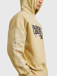 Fear Of God x DSYF Support Liberation Now Hoodie Hoodie unisex detail view 4 | Dash Racegear — DSYF Fear of God 2026 Support Liberation hoodie, beige tone, cozy oversized fit for men and women street fashion.