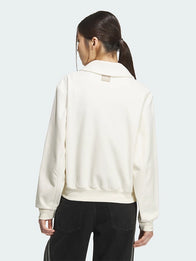 Adidas 2026 LNY Halfzip Sweatshirt Sweatshirt unisex detail view 2 | Dash Racegear — Recreation cream Adidas Lunar New Year fleece sweatshirt with halfzip closure and soft texture