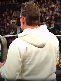 CM Punk Beige Hoodie Hoodie unisex detail view 6 | Dash Racegear — WWE RAW 2025 White Hoodie showcasing the “Best In The World” face-off between CM Punk and Jey Uso.