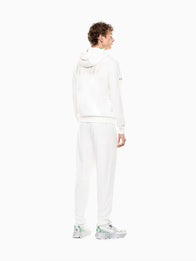 Winter Olympics 2026 Team Italy EA7 Emporio Armani Tracksuit Tracksuit unisex detail view 3 | Dash Racegear — Team Italy Winter Olympics 2026 EA7 Emporio Armani white tracksuit, casual comfort with premium style.