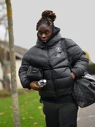 Chelsea FC UEFA Women’s Champions League Puffer Jacket Puffer Jacket unisex detail view 3 | Dash Racegear — Black Chelsea FC 2025 Women’s Champions League jacket combines a soft hood and puffed insulation for ultimate fan comfort.