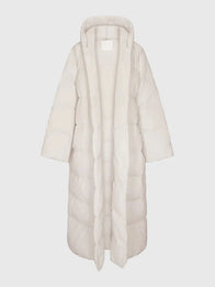 The North Face x Skims Nuptse Wrap Parka Coat Coat unisex detail view 9 | Dash Racegear — Women's The North Face x Skims Nuptse Wrap Parka Off-White Coat, wrap closure, quilted texture, cozy warmth, ideal for cold-weather streetwear.