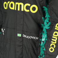 FIA and Puma collar label on Felipe Drugovich’s 2025 Aston Martin F1 race suit – Dash Racegear.