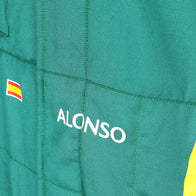 Alonso name and Spanish flag detail on the green 2026 Aston Martin F1 race suit – Dash Racegear.