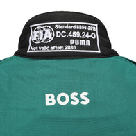 FIA and Puma collar label on Fernando Alonso’s 2026 Aston Martin F1 race suit – Dash Racegear.