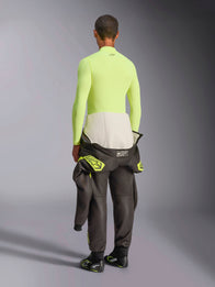 Alpinestars ZX Evo V3 Long Sleeve Top, Yellow Fluo, rear view of model wearing fire-resistant base layer with dark racing suit pants and boots, professional motorsport technical underwear