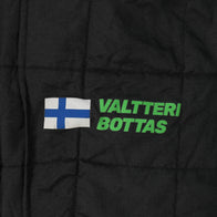 Web Eyewear, Mascot Workwear and Pirelli sleeve logos on Bottas’s 2024 F1 race suit – Dash Racegear.
