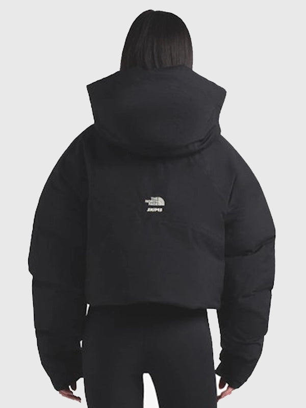 The North Face x Skims Insulated Shell Jacket Jacket unisex detail view 3 | Dash Racegear — The North Face x SKIMS Women’s 2025 Black Insulated Puffer Jacket in black with glossy finish, ideal for outdoor layering.