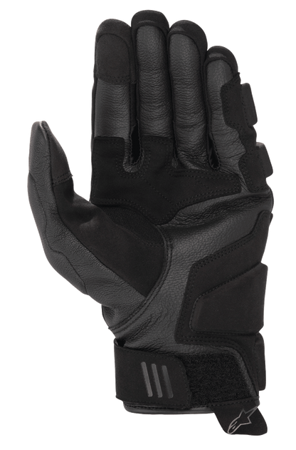 Alpinestars Phenom Leather Gloves, Motorcycle Gloves, Black, palm view featuring reinforced goat leather construction, padded landing zones, and short cuff design with adjustable wrist strap and Alpinestars logo pull tab
