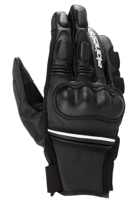 Alpinestars Phenom Leather Gloves, Black and White, short-cuff motorcycle gloves with hard knuckle protection, perforated leather details, white Alpinestars branding on the index finger, and white stripe accent at the wrist