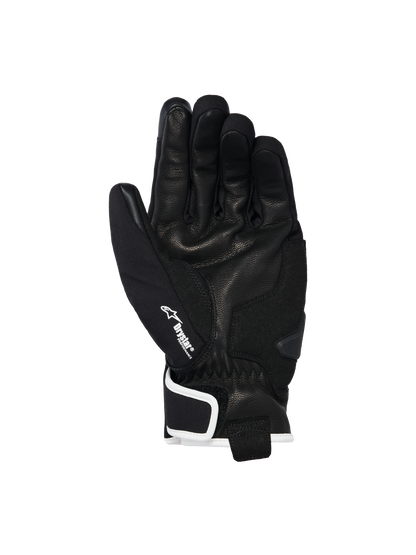 Alpinestars Moblast Waterproof Gloves, Black with Off-White trim, palm side view showing goat leather construction, white Drystar logo on the thumb, and palm slider reinforcement, short-cuff urban motorcycle gear