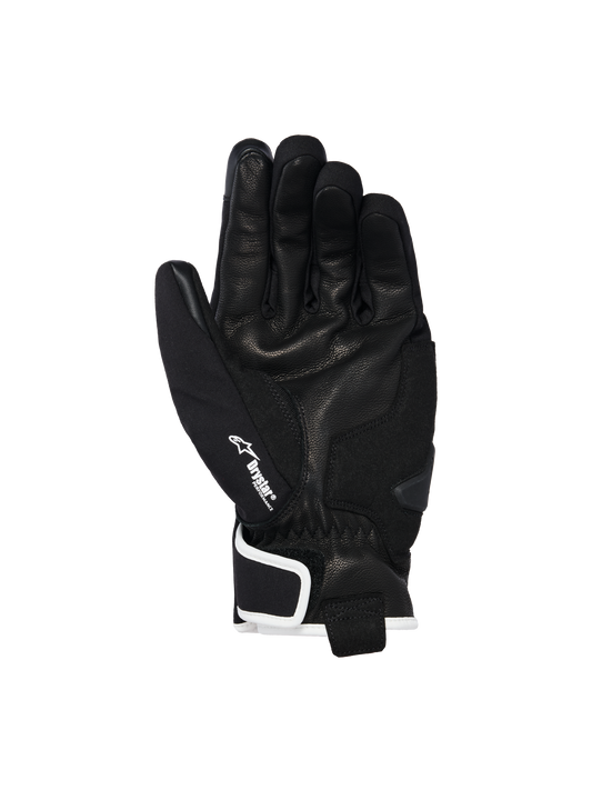 Alpinestars Moblast Waterproof Gloves, Black with Off-White trim, palm side view showing goat leather construction, white Drystar logo on the thumb, and palm slider reinforcement, short-cuff urban motorcycle gear