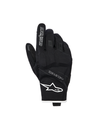 Alpinestars Moblast Waterproof Gloves, Motorcycle Gloves, Black and White, backhand view showing white star logo on the wrist and 'astars' branding on the index finger, featuring MO.ST.EQ. text and textured stretch material with reinforced knuckles, short-cuff design.