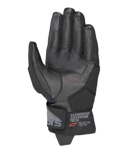 Alpinestars Corozal V3 Drystar® Gloves, Black, Palm side view showing leather construction with reinforced patches, short cuff with Alpinestars Adventure Tech branding, touchscreen-compatible fingertips, durable all-weather adventure motorcycle gear.